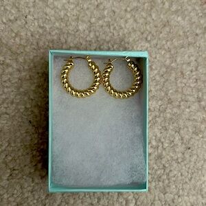 Medium sized gold plated hoop, earrings.